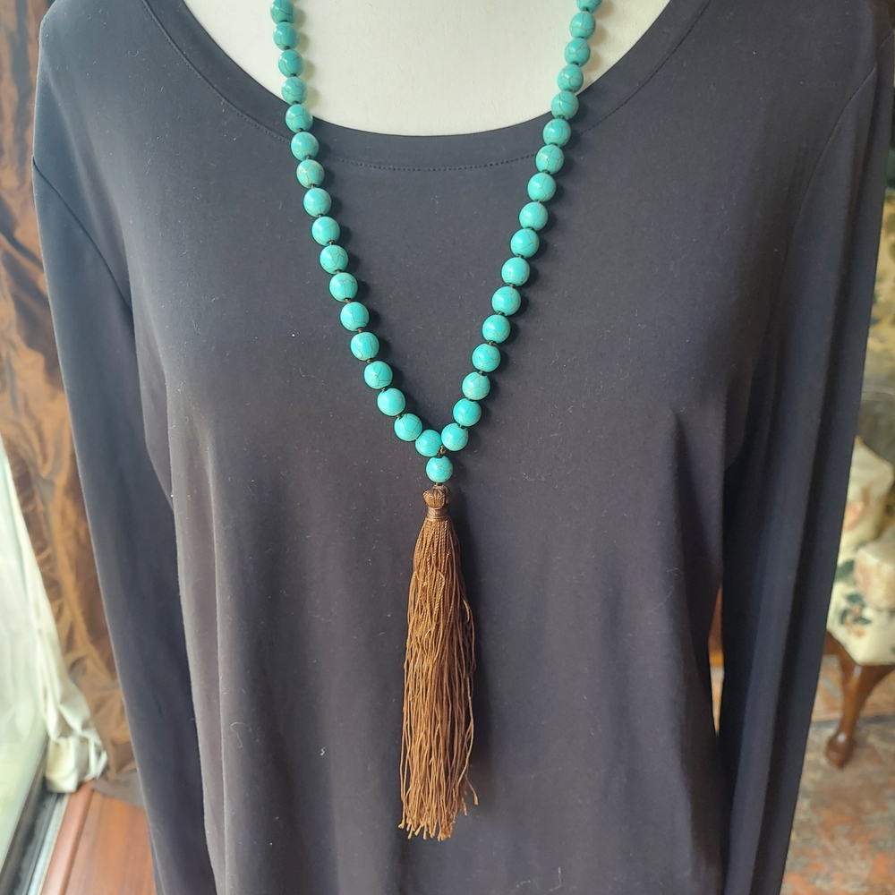 Elegant Turquoise Beaded Necklace with Brown Tassel
